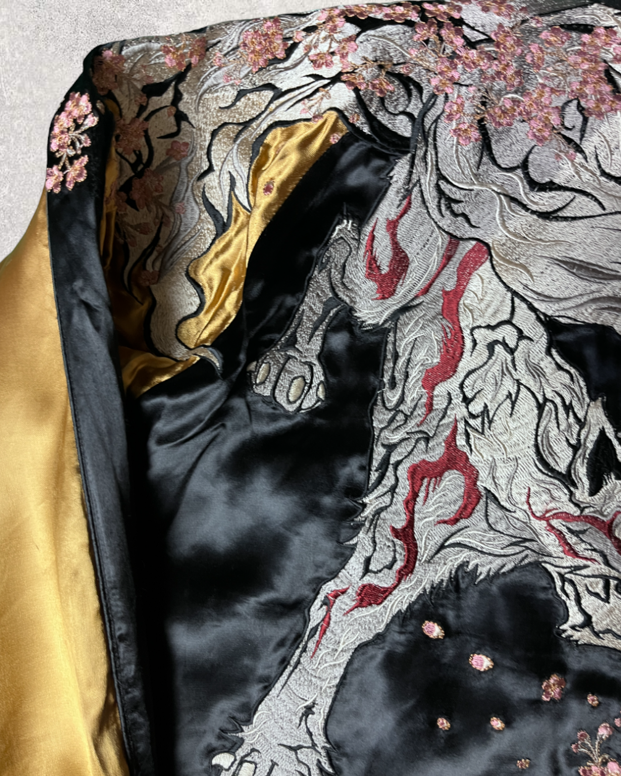 White wolf flurry of falling cherry blossoms | Autumn/winter | Vintage